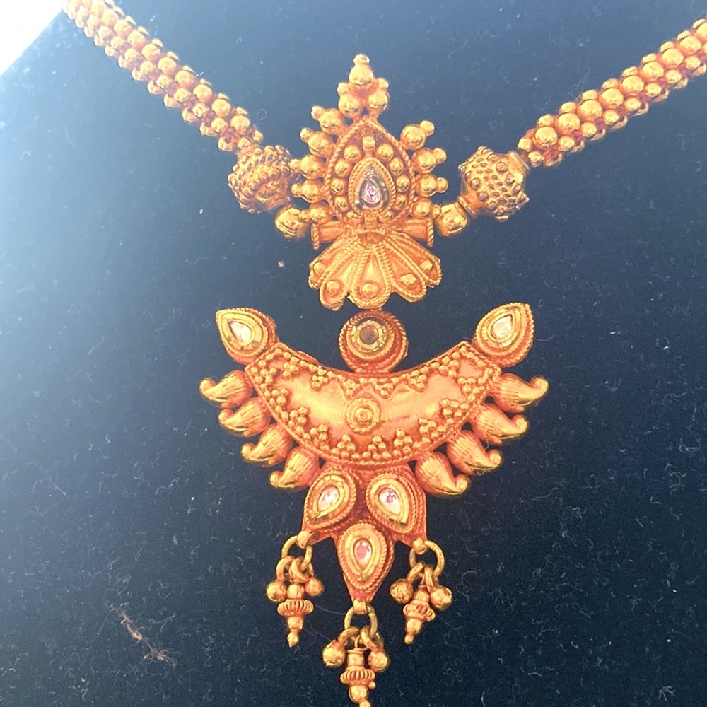 Indian gold plated silver ornate necklace.